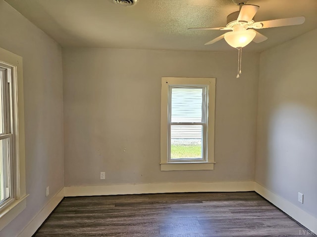 1275 Cedar Ave, Buena Vista, VA 24416 - unfurnished room with dark wood-type flooring and ceiling fan