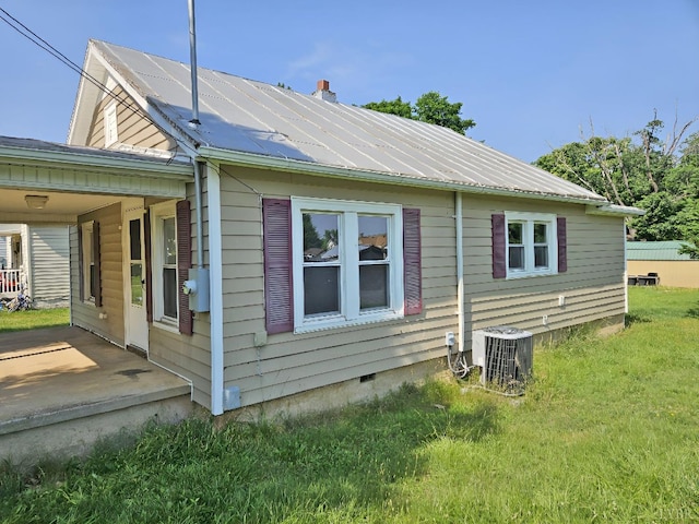 1275 Cedar Ave, Buena Vista, VA 24416 - view of property exterior with a metal roof, crawl space, and a lawn