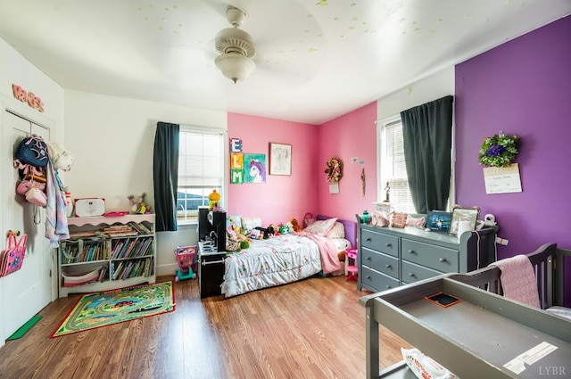 899 Brook St, Lynchburg, VA 24501 - bedroom with multiple windows, wood finished floors, and a ceiling fan