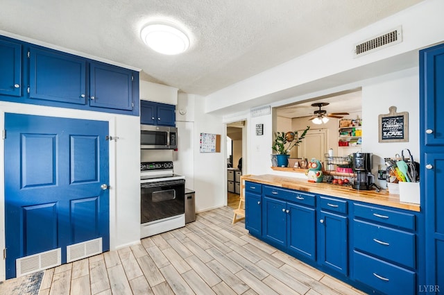 899 Brook St, Lynchburg, VA 24501 - kitchen featuring stainless steel microwave, white range with electric cooktop, blue cabinets, a textured ceiling, and a ceiling fan