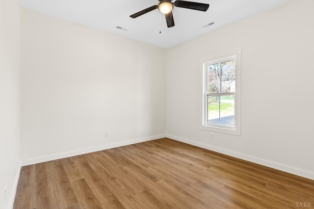 7 Hickory Cove Ln, Moneta, VA 24121 - spare room with light wood-style floors and ceiling fan