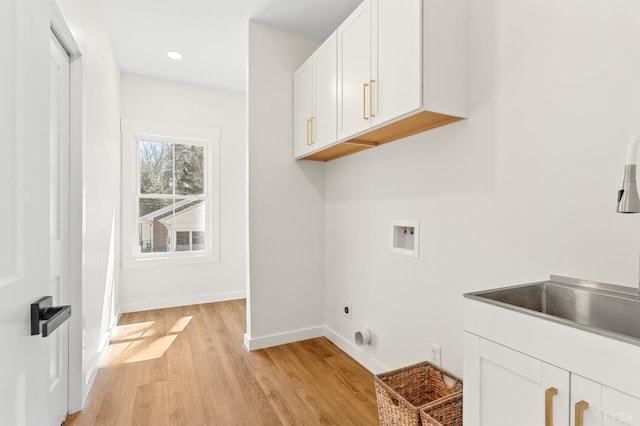 7 Hickory Cove Ln, Moneta, VA 24121 - laundry room featuring washer hookup, light wood-type flooring, electric dryer hookup, cabinet space, and recessed lighting