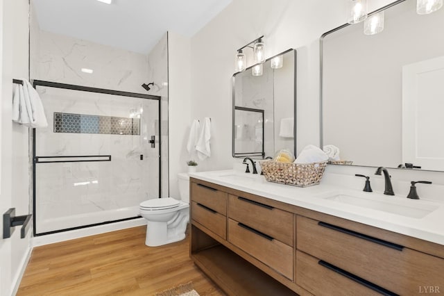 7 Hickory Cove Ln, Moneta, VA 24121 - full bathroom featuring a marble finish shower, double vanity, and wood finished floors