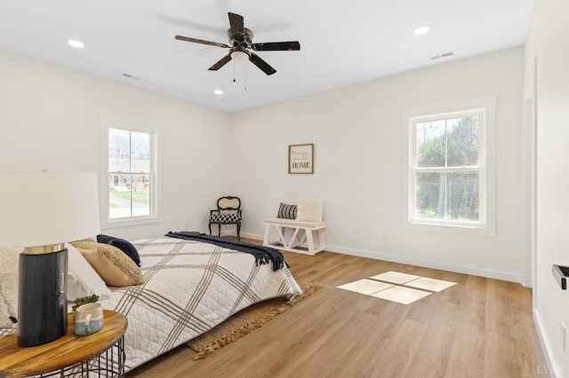 7 Hickory Cove Ln, Moneta, VA 24121 - bedroom with multiple windows, wood finished floors, recessed lighting, and ceiling fan