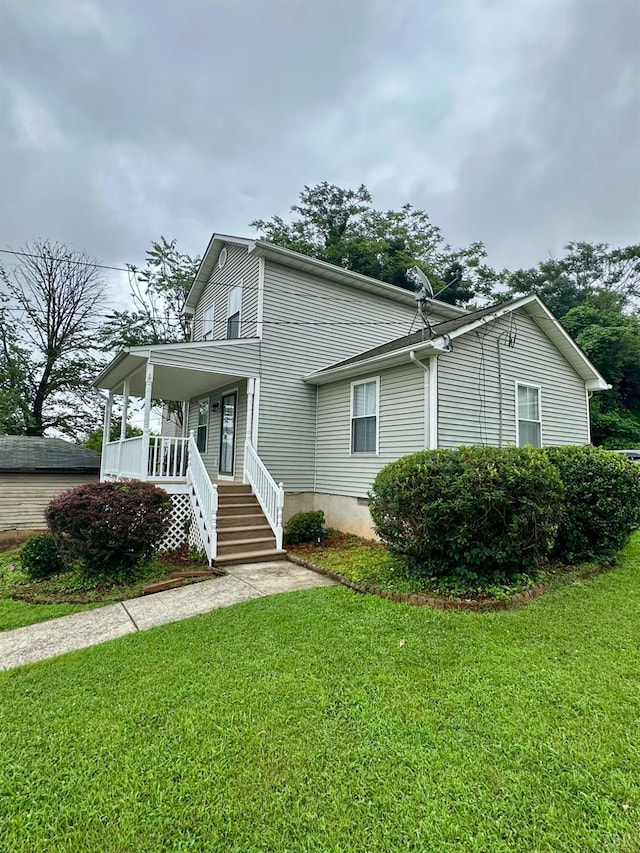 1310 9th St, Lynchburg, VA 24501 - view of front of house featuring covered porch and a front lawn