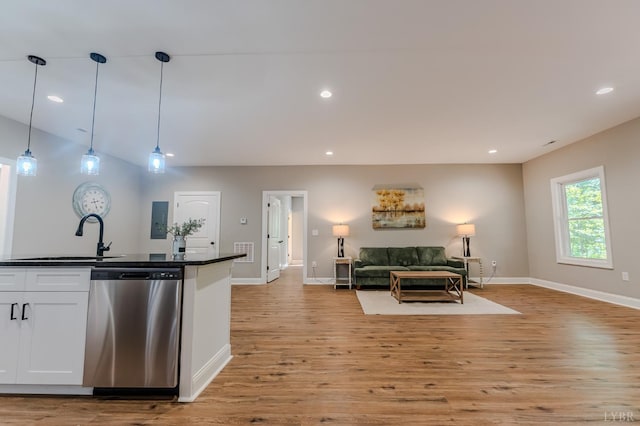 109 Tosh Ln, Goodview, VA 24095 - kitchen featuring dishwasher, dark countertops, open floor plan, white cabinets, and light wood-type flooring