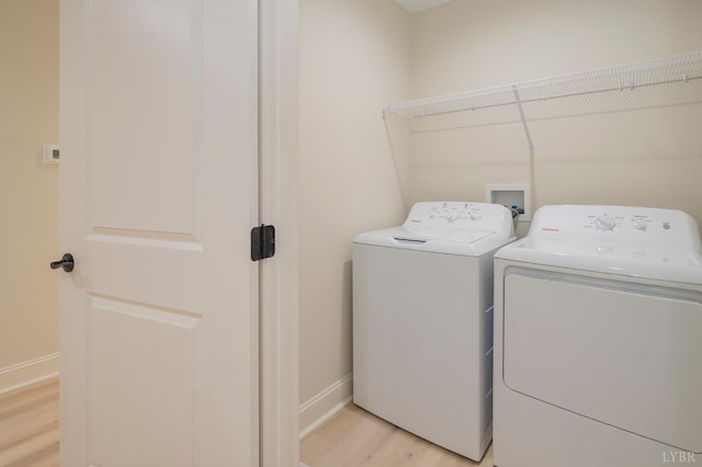 1016 Misty Mountain Rd, Lynchburg, VA 24502 - laundry room with independent washer and dryer and light wood-style floors