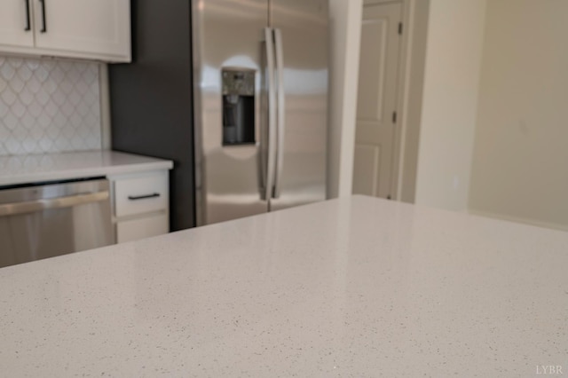 1016 Misty Mountain Rd, Lynchburg, VA 24502 - kitchen featuring appliances with stainless steel finishes, white cabinetry, and light stone countertops