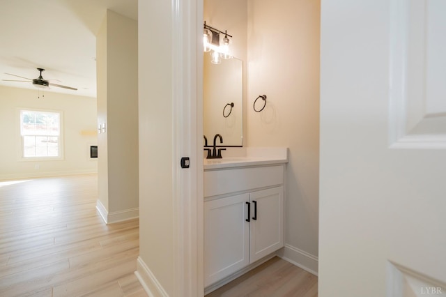 1016 Misty Mountain Rd, Lynchburg, VA 24502 - bathroom with vanity, a ceiling fan, and wood finished floors
