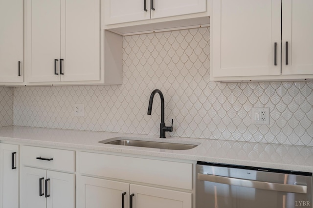 1016 Misty Mountain Rd, Lynchburg, VA 24502 - kitchen with stainless steel dishwasher, light countertops, backsplash, and white cabinetry