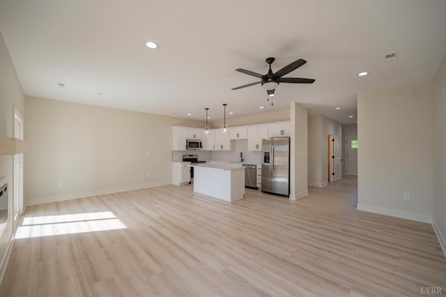 1016 Misty Mountain Rd, Lynchburg, VA 24502 - unfurnished living room with recessed lighting, light wood-style flooring, and a ceiling fan