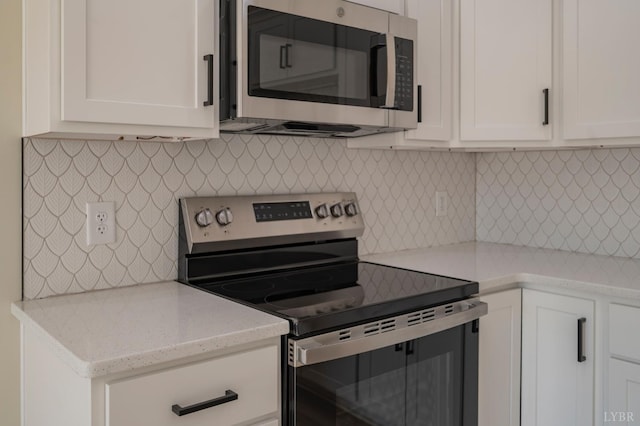 1016 Misty Mountain Rd, Lynchburg, VA 24502 - kitchen featuring appliances with stainless steel finishes and white cabinetry