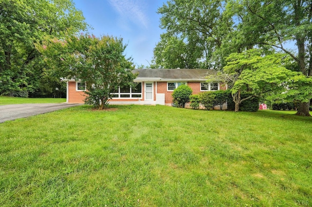 7131 Meadowbrook Rd, Lynchburg, VA 24502 - ranch-style house featuring driveway, a front yard, and brick siding