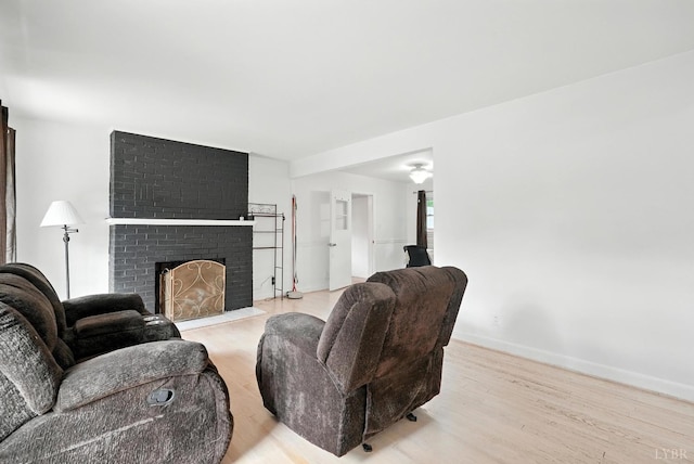 7131 Meadowbrook Rd, Lynchburg, VA 24502 - living area with wood finished floors and a brick fireplace