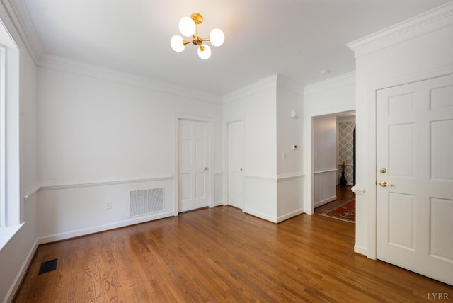 104 Overlink Ct, Lynchburg, VA 24503 - empty room with a chandelier, wood finished floors, and ornamental molding