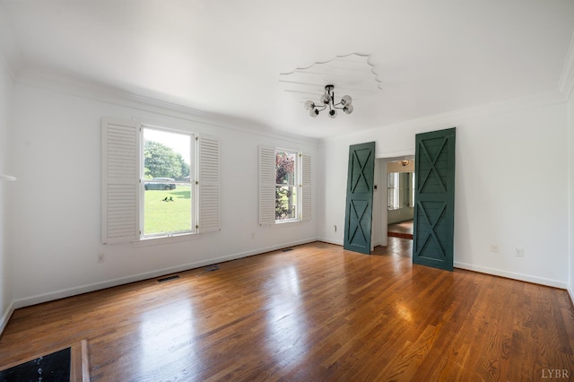 104 Overlink Ct, Lynchburg, VA 24503 - unfurnished room featuring ornamental molding, wood finished floors, and a chandelier