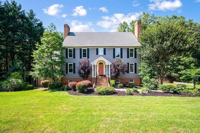 104 Overlink Ct, Lynchburg, VA 24503 - colonial inspired home with a front yard and a chimney
