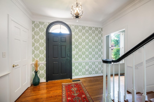 104 Overlink Ct, Lynchburg, VA 24503 - foyer featuring stairway, wallpapered walls, ornamental molding, a chandelier, and wood finished floors