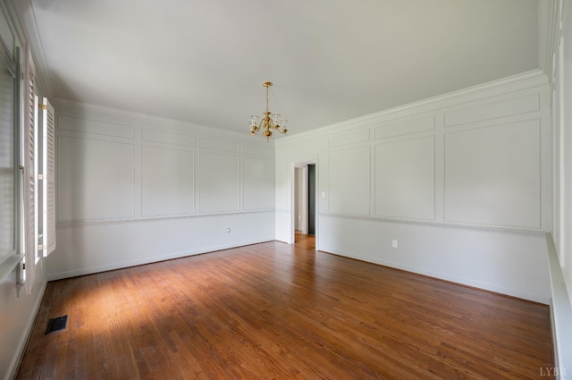 104 Overlink Ct, Lynchburg, VA 24503 - spare room with a decorative wall, a chandelier, and dark wood finished floors