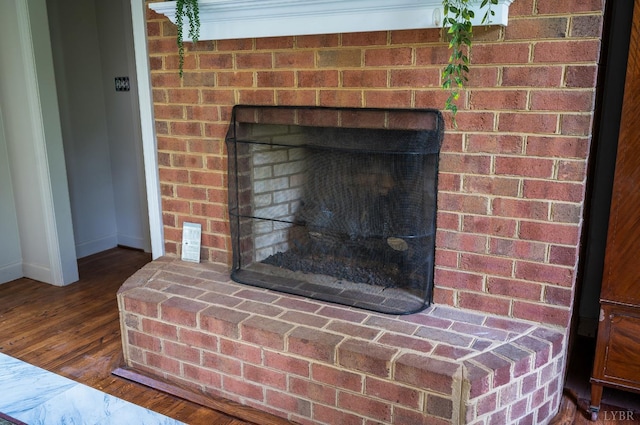 104 Overlink Ct, Lynchburg, VA 24503 - detailed view of a brick fireplace and wood finished floors