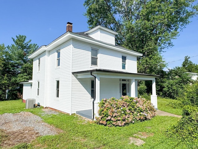 110 3rd St, Madison Heights, VA 24572 - view of home's exterior featuring a chimney and a lawn