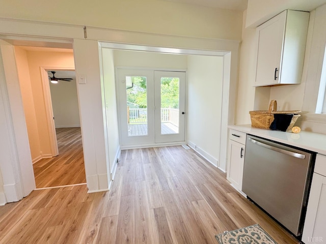 110 3rd St, Madison Heights, VA 24572 - kitchen with dishwasher, light countertops, light wood-style flooring, white cabinetry, and ceiling fan
