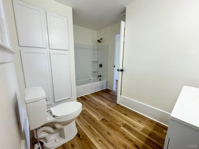 110 3rd St, Madison Heights, VA 24572 - bathroom with vanity, shower / bathtub combination, and wood finished floors