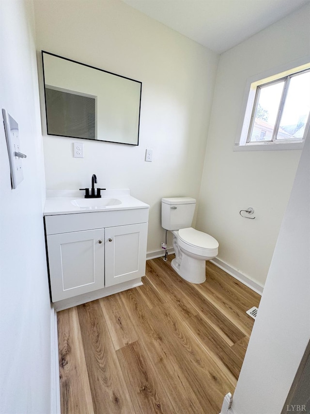 110 3rd St, Madison Heights, VA 24572 - half bathroom with wood finished floors and vanity
