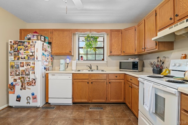701 Goose Ridge Dr, Forest, VA 24551 - kitchen with white appliances, under cabinet range hood, light countertops, and ceiling fan