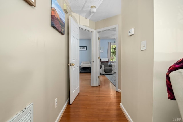 701 Goose Ridge Dr, Forest, VA 24551 - hallway featuring wood finished floors and baseboards