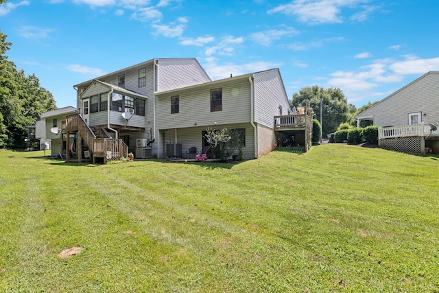 701 Goose Ridge Dr, Forest, VA 24551 - rear view of house featuring stairway, a yard, a deck, and a sunroom