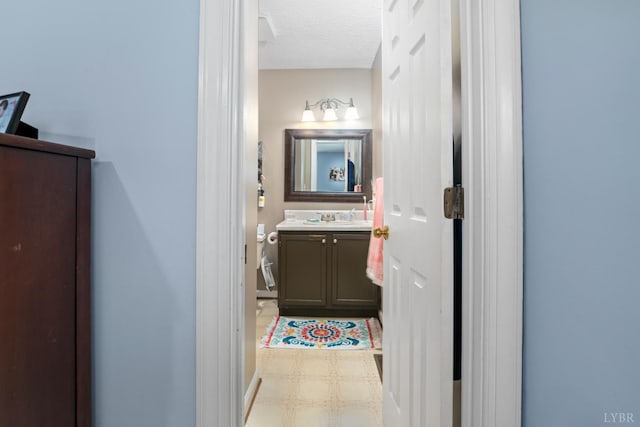 701 Goose Ridge Dr, Forest, VA 24551 - half bathroom with vanity and a textured ceiling