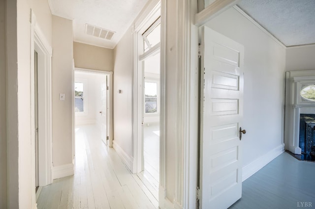 838 Rivermont Ave, Lynchburg, VA 24504 - hallway featuring light wood-type flooring and a textured ceiling