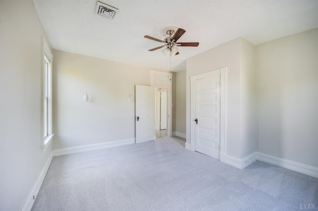 838 Rivermont Ave, Lynchburg, VA 24504 - unfurnished room with carpet flooring, a ceiling fan, and healthy amount of natural light