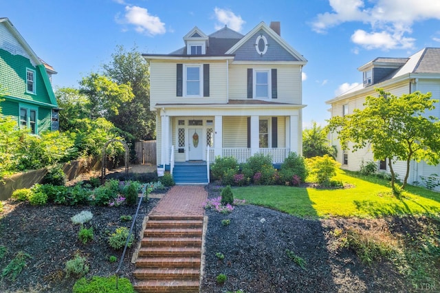838 Rivermont Ave, Lynchburg, VA 24504 - victorian home featuring a porch and a chimney