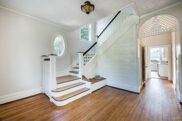 838 Rivermont Ave, Lynchburg, VA 24504 - stairs with hardwood / wood-style flooring and ornamental molding