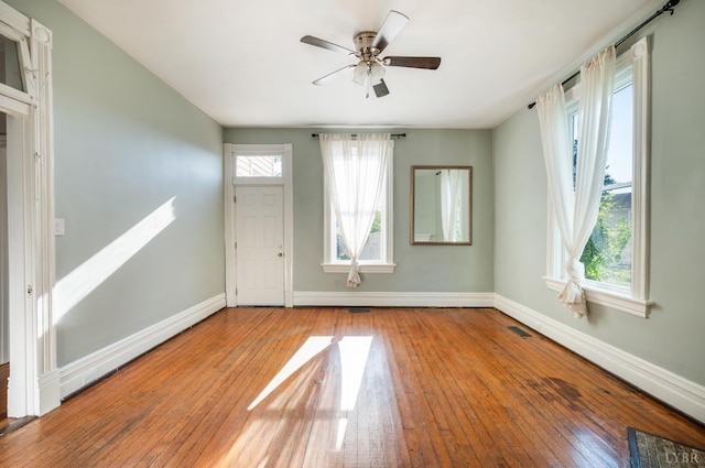 838 Rivermont Ave, Lynchburg, VA 24504 - empty room with wood-type flooring and ceiling fan