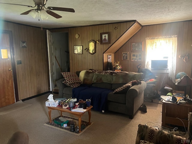 3200 Pocket Rd, Hurt, VA 24563 - living area featuring a ceiling fan, carpet, wood walls, and a textured ceiling