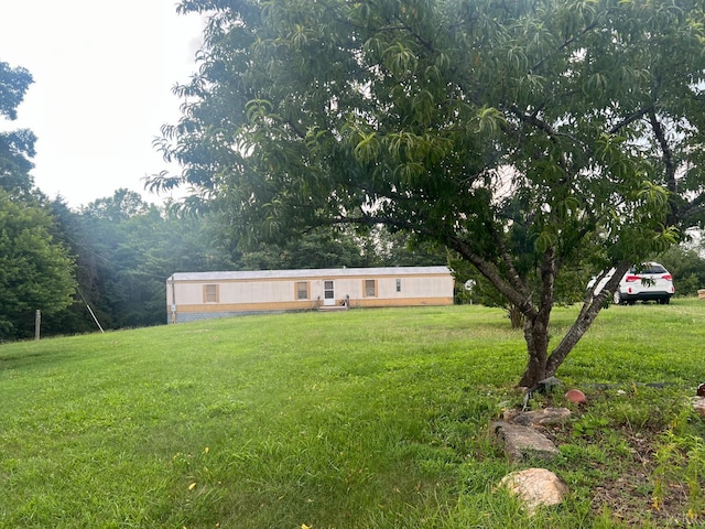 3200 Pocket Rd, Hurt, VA 24563 - manufactured / mobile home featuring a front lawn