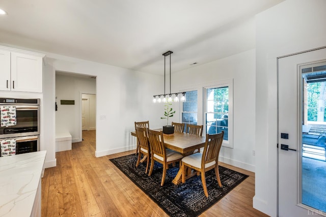 336 Somerset Dr, Appomattox, VA 24522 - dining space featuring light wood-style flooring and healthy amount of natural light
