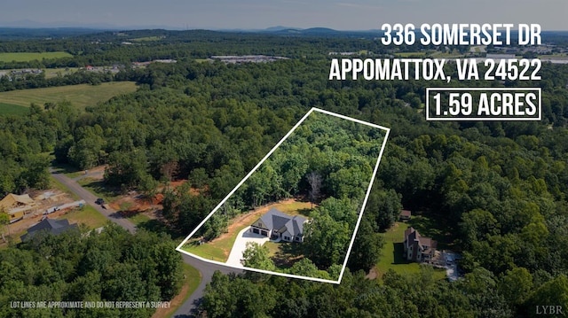 336 Somerset Dr, Appomattox, VA 24522 - aerial view of property and surrounding area with a heavily wooded area and property boundaries highlighted
