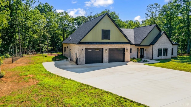 336 Somerset Dr, Appomattox, VA 24522 - view of front of home with brick siding, concrete driveway, and roof with shingles