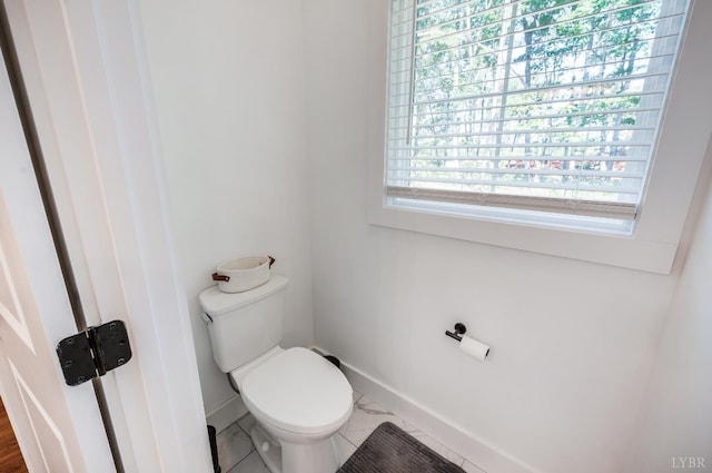 336 Somerset Dr, Appomattox, VA 24522 - bathroom featuring baseboards and toilet
