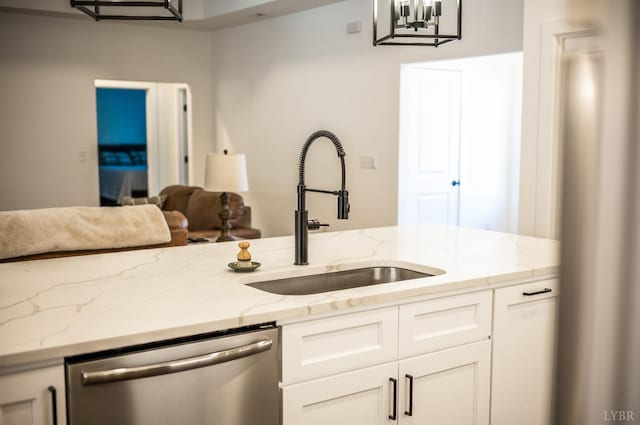 336 Somerset Dr, Appomattox, VA 24522 - kitchen with dishwasher, open floor plan, white cabinets, and light stone counters