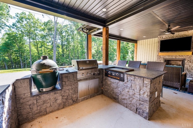 336 Somerset Dr, Appomattox, VA 24522 - view of patio / terrace with an outdoor kitchen, ceiling fan, and a fireplace