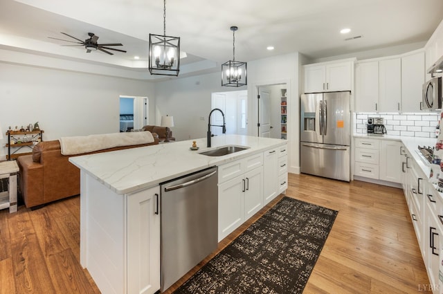336 Somerset Dr, Appomattox, VA 24522 - kitchen with stainless steel appliances, open floor plan, light wood-style floors, recessed lighting, and backsplash