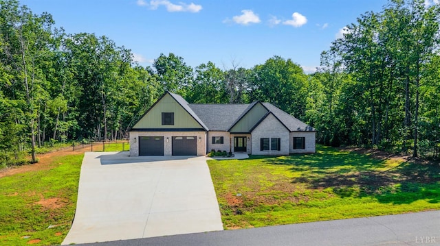 336 Somerset Dr, Appomattox, VA 24522 - modern farmhouse style home featuring concrete driveway, a front lawn, and an attached garage