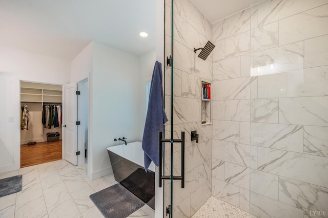336 Somerset Dr, Appomattox, VA 24522 - full bath featuring a freestanding bath, a walk in closet, a tile shower, marble look tiles, and recessed lighting