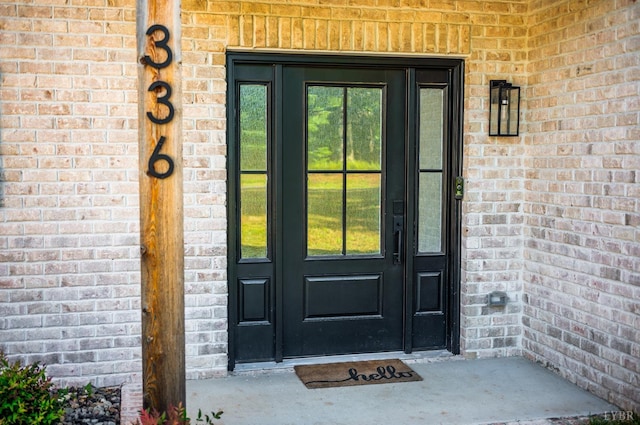 336 Somerset Dr, Appomattox, VA 24522 - doorway to property featuring brick siding