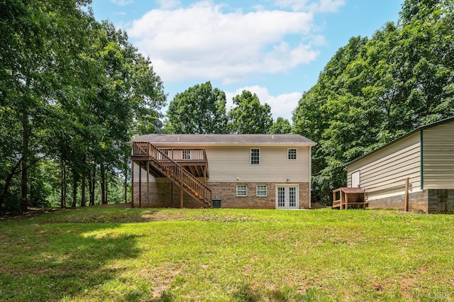 1279 Buck Creek Rd, Appomattox, VA 24522 - back of property featuring stairway, french doors, a deck, a yard, and brick siding